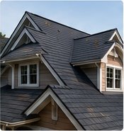 Shingle roof and gabled exterior of a suburban home